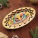 Plate of an oval candy "Happy New Year 2025"