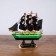 Duncan ship, 10x3x10 cm, green hull, black sails