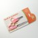 Carrying for claws: scissors-codlons (hole 6 mm) and a file, pink with white