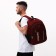 Male backpack on a zipper, 2 lightning departments, 5 external pockets, burgundy color