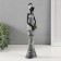 Souvenir Polystone "African in white with golden flowers" 4.8x7x29 cm