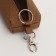 Key of zipper, length 16 cm, ring, carbine, brown color