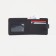 Men's purse on the button, a department for bills, for cards, black color