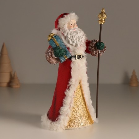 Polystone souvenir "Santa Claus in a red fur coat, with a staff, with a gift" 11.5x8.5x20.5 cm-1