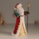 Polystone souvenir "Santa Claus in a red fur coat, with a staff, with a gift" 11.5x8.5x20.5 cm