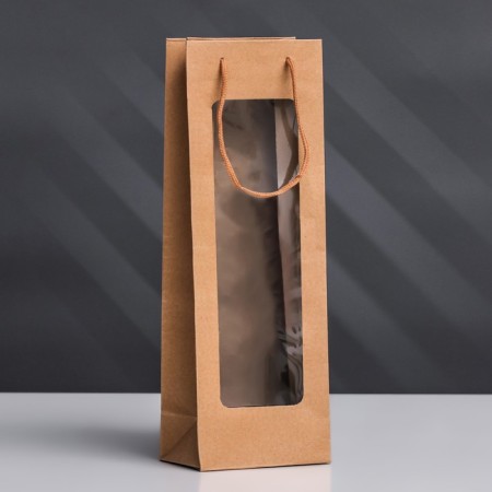 A package for a bottle with a plastic window 12.5 × 8.5 × 36 cm, craft