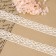 Knitted lace, 28 mm × 10 ± 1 m, beige color