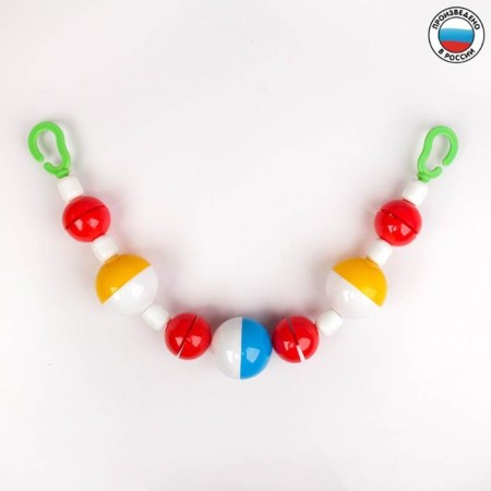 Stretching to a stroller/crib "beads", Aelita-1