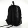 City backpack on a zipper, black color
