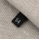 Textile strip “54”, 4.6 x 1.1 cm, black color