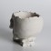 Figure candle in concrete "Crying skull", red