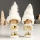 Souvenir Polystone "Baby in a white outfit with a snowflake, with a candy/star" MIX 6x5x16 cm