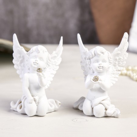 Suvenir Polystone "A Snowthrough Angel with a ball of rhinestones sits" mix 8x6x2.5 cm