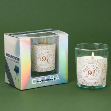 New Year's candle in a glass 