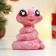 New Year. Symbol 2025. Figure soap "snake" pink with silver