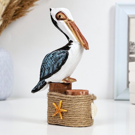 Figure "Pelican on buoys" 10.5x7x9cm