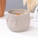Superior wax candle in the Kashpo "Faces", 12x9 cm, gray