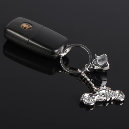 Cartage keychain, "bike with a helmet", chrome