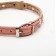 The collar is two-layer leather with rhinestones, 1.2 x 35 cm, Osh 20-30 cm, pink