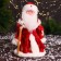 Santa Claus "In a fur coat with folding sleeves and a staff" 30 cm, moves, red