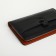Male purse-clate on a zipper, black color