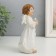 Souvenir Polystone "Angel in beige toga with a heart" 6x8.5x16 cm