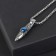 Pompeii pendulum of a dagger with an eye, the color is blue in black silver, 70 cm