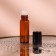 Window bottle for perfume, with a glass roller, 5 ml, brown color/black