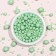 Sprinking confectionery in color glaze emerald mix