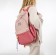 A backpack with a zipper, 4 external pockets, pink color