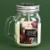 New Year's candle in a bank with a pen "Sweetness", chocolate