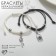 Bracelets "Demetrons" key with a lock, black and white color, 7 cm