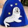 Bath cap with an applique "playful seal"