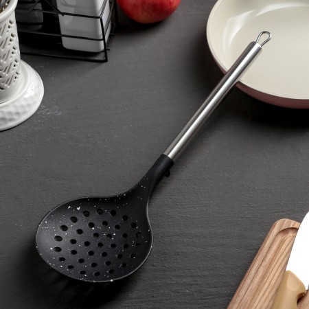 A spoon with the slots of the fernan, 34 cm, the color is black