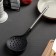 A spoon with the slots of the fernan, 34 cm, the color is black