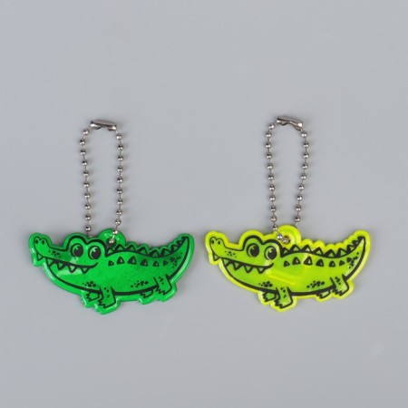 The reflective element "crocodile", bilateral, 5.5 × 3 cm, color mix-4