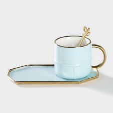 Tea couple ceramic with a spoon 