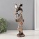 Polystone souvenir "African with a flower by a tree with mirror leaves" 13x9x32 cm