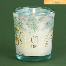 New Year's candle in a glass of 