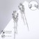 Hanging earrings with rhinestones "Firebird" with drops on a chain, white color in silver, 7 cm