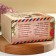 Gift set “Happy March 8”: herbal tea 20 g, jam from pine cones with lingonberries of 30 g, syrup 100 ml.