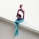 Polystone souvenir "A man with a book" Pink-blue 5.9x9.4x23 cm