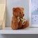 Soft toy "Bear with a bow", with hearts, color mix