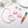 Set of children's "chosen" 6 items: 2 elastic bands, clips, beads, bracelet, felt -tip pen, kitten, color
