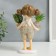 Polystone souvenir "Baby with tails, with plants in pots" 20.5x8x10.3 cm