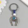 Keychain from the evil eye Metal "horseshoe" 3x6.5 cm
