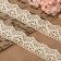 Knitted lace, 32 mm × 10 ± 1 m, beige color