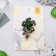 Brooch "Flower of desires", emerald color in black gold