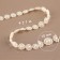 Pearls on threads, flat, 10 mm, 9 ± 1 m, milk color