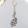 Metal keychain "Peacock" silver/gold 7.2x3 cm